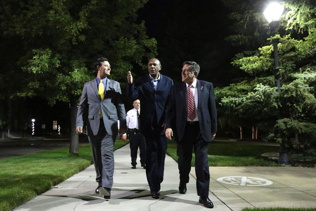 Nevada Assemblymen, from left, Stephen Silberkraus, Harvey Munford and PK O'Neill walk back from the Capitol after telling Gov. Brian Sandoval they concluded their business following the end of th ...