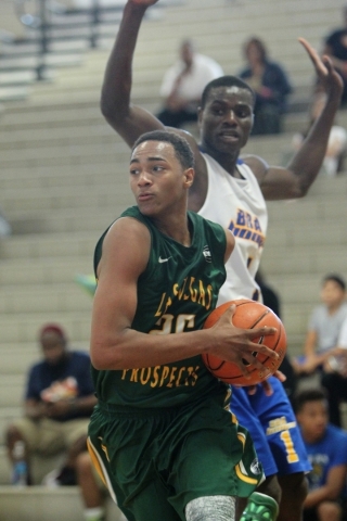 Swingman Charles O‘Bannon of the Las Vegas Prospects takes the ball to the basket agai ...