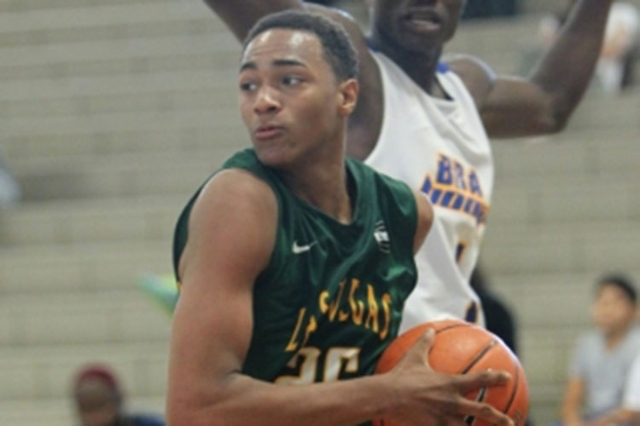 Swingman Charles O‘Bannon of the Las Vegas Prospects takes the ball to the basket agai ...