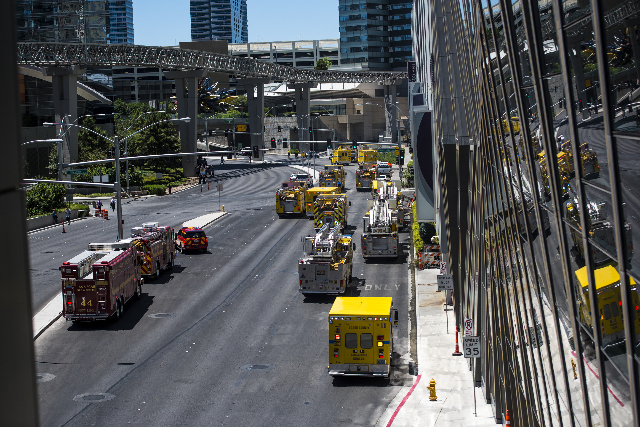 Clark County and Las Vegas fire units park on Harmon Avenue as they respond to a fire at the pool of The Cosmopolitan hotel-casino on the strip in Las Vegas on Saturday, July 25, 2015. (Joshua Dah ...