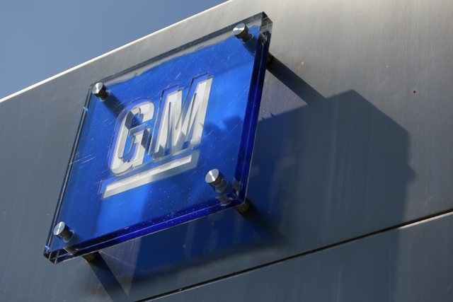 The General Motors logo is seen outside its headquarters at the Renaissance Center in Detroit, Michigan in this file photograph taken August 25, 2009. (Jeff Kowalsky/Reuters)