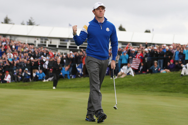 Sep 28, 2014; Auchterarder, Perthshire, SCT; European player Rory McIlroy reacts to making birdie and winning the first hole on day three during the 2014 Ryder Cup at Gleneagles Resort - PGA Cente ...
