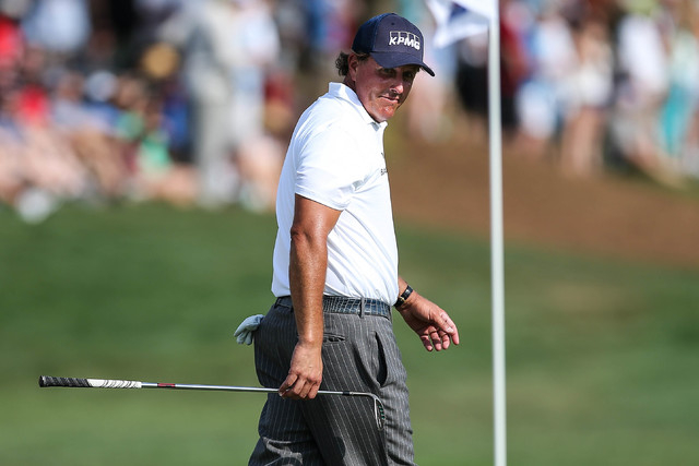 May 16, 2015; Charlotte, NC, USA;  Phil Mickelson reacts after he triple bogey the final hole of the day during third round play at Quail Hollow Club. (Jim Dedmon-USA TODAY Sports)