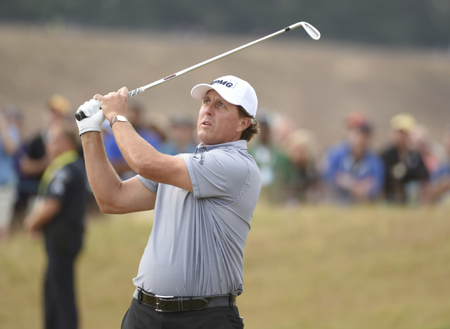 Jun 18, 2015; University Place, WA, USA; Phil Mickelson hits his tee shot on the 3rd hole in the first round of the 2015 U.S. Open golf tournament at Chambers Bay. (John David Mercer-USA TODAY Sports)
