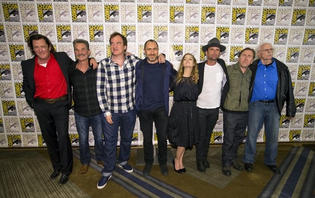 Director of the movie Quentin Tarantino (3rd L) poses with cast member (from L-R) Michael Madsen, Kurt Russell, Demian Bichir, Jennifer Jason Leigh, Walton Goggins, Tim Roth and Bruce Dern at a pr ...