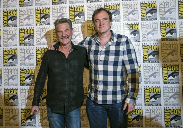 Director of the movie Quentin Tarantino (R) poses with cast member Kurt Russell at a press line for "The Hateful Eight" during the 2015 Comic-Con International Convention in San Diego, California ...