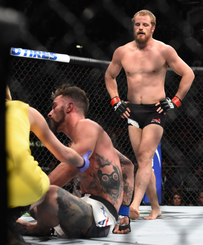 Gunnar Nelson walks across the octagon after submitting Brandon Thatch in the first round of their fight at UFC 189 Saturday, July 11, 2015 at the MGM Grand Garden Arena in Las Vegas, Nevada. CRE ...