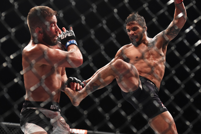 Dennis Bermudez throws a flying kick at Jeremy Stephens during their fight at UFC 189 Saturday, July 11, 2015 at the MGM Grand Garden Arena in Las Vegas, Nevada. CREDIT: Sam Morris/Las Vegas News  ...