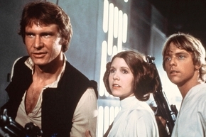This publicity film image provided by 20th Century-Fox Film Corporation shows, from left, Harrison Ford as Han Solo, Carrie Fisher as Princess Leia Organa and Mark Hamill as Luke Skywalker in a sc ...