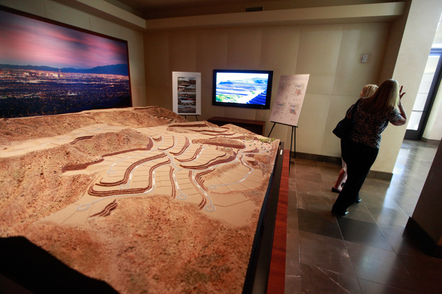 A model of Ascaya, a luxury home development, in the hills of the McCullough mountain range in Henderson, Nev. is seen in the sales center on Tuesday, July 7, 2015. Over 300 homes are planned in t ...