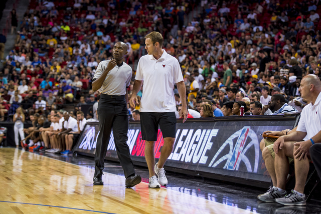 Fred Hoiberg, the head coach of the Chicago Bulls, talks with an official during basketball action against the Minnesota Timberwolves during the NBA Summer League at the Thomas & Mack Center in La ...