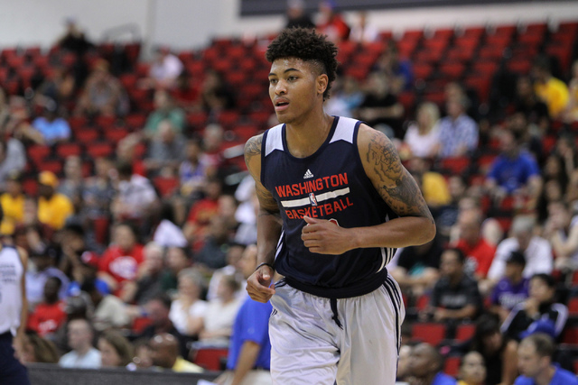 Washington's Kelly Oubre Jr. (12) runs down the court in his NBA Summer League game against the NBA Development League team at Cox Pavilion at UNLV in Las Vegas Sunday, July 12, 2015. (Erik Verduz ...