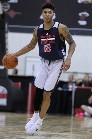 Washington's Kelly Oubre Jr. (12) runs the ball down the court in his NBA Summer League game against the NBA Development League team at Cox Pavilion at UNLV in Las Vegas Sunday, July 12, 2015. (Er ...