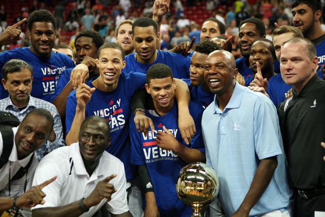 Sacramento celebrates after winning the NBA Summer League championship game 77-68 against Houston at the Thomas & Mack Center Monday, July 21, 2014, in Las Vegas. Ray McCallum was named MVP and sc ...