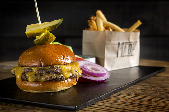 A Double Stack Burger Meister as seen  Monday, Aug. 18, 2014 at  Made LV in the Tivoli Village. The burger is Niman Ranch Beef, cheddar cheese, house made steak sauce and fench fries. (Jeff Scheid ...