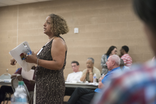 Development and modernization coordinator, Melanie Braud, takes questions form attendees during North Valley Leadership Team's meeting at Dr. William U. Pearson Community Center in North Las Vegas ...