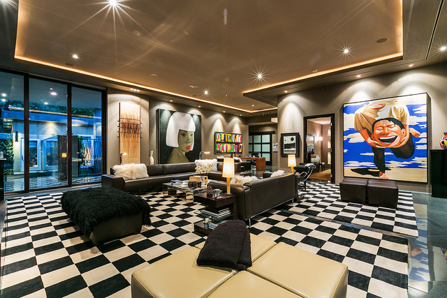 The home's great room is of a modern design and displays artwork (Courtesy photo)
