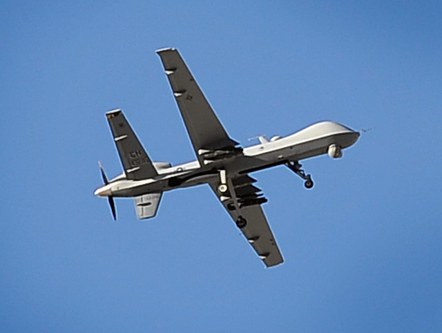 A MQ-9 Reaper drone flies over Creech Air Force Base in Indian Springs, Nev. on Tuesday, Oct. 14, 2014. (David Becker/Las Vegas Review-Journal)