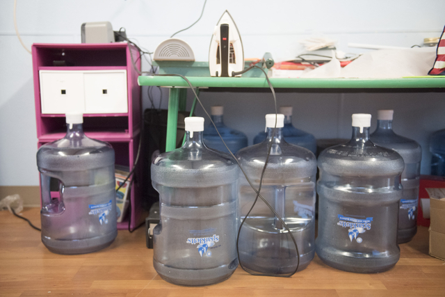 Used water cooler bottles are shown at Mountain Heights Montessori in Las Vegas, Wednesday, July 1, 2015.(Jason Ogulnik/Las Vegas Review-Journal)