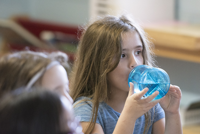 A student at Mountain Heights Montessori in Las Vegas drinks from her water bottle, Wednesday, July 1, 2015.(Jason Ogulnik/Las Vegas Review-Journal)