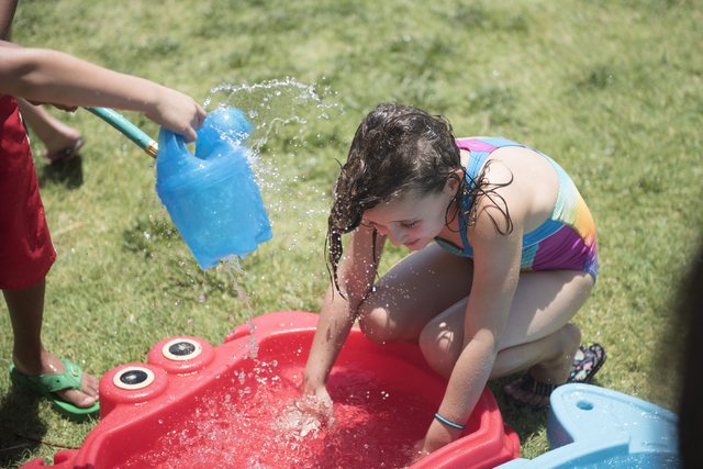 Students at Mountain Heights Montessori in Las Vegas participate in Water Wednesdays, Wednesday, July 1, 2015.(Jason Ogulnik/Las Vegas Review-Journal)