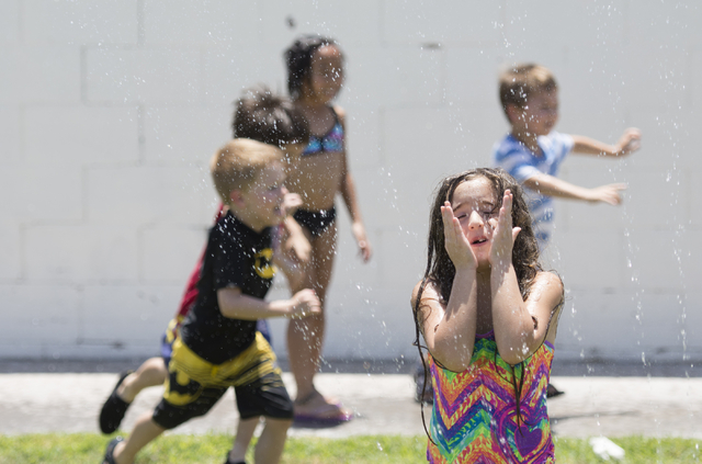 Students at Mountain Heights Montessori in Las Vegas participate in Water Wednesdays, Wednesday, July 1, 2015.(Jason Ogulnik/Las Vegas Review-Journal)