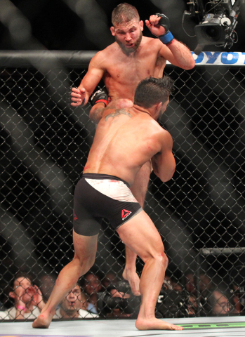 Jeremy Stephens, above, knees Dennis Bermudez during UFC 189 at the MGM Grand Garden Arena Saturday, July 11, 2015, in Las Vegas. Stephens won by knockout. (Chase Stevens/Las Vegas Review-Journal) ...