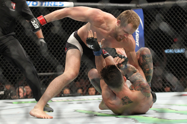 Gunnar Nelson, left, looks to hit Brandon Thatch during UFC 189 at the MGM Grand Garden Arena Saturday, July 11, 2015, in Las Vegas. Nelson won by knockout. (Chase Stevens/Las Vegas Review-Journal ...