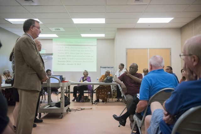 Gene Collins addresses a question to Melanie Braud, development and modernization coordinator, during North Valley Leadership Team's meeting at Dr. William U. Pearson Community Center in North Las ...
