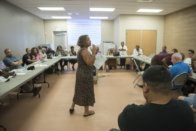 Development and modernization coordinator, Melanie Braud, center, takes questions from attendees during North Valley Leadership Team's meeting at Dr. William U. Pearson Community Center in North L ...