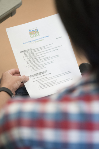 Paperwork stating the progress of the Choice Neighborhood grant is shown during the North Valley Leadership Team's meeting at Dr. William U. Pearson Community Center in North Las Vegas, Saturday, ...