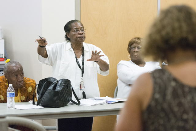 Florence Hardwick, second from left, directs a question to Cass Palmer, North Las Vegas director of Neighborhood and Leisure Services, at Dr. William U. Pearson Community Center in North Las Vegas ...