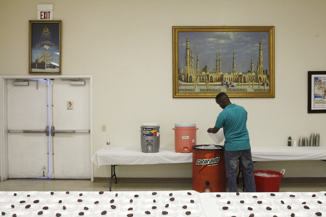 Yasmin Aware prepares bottles of water for Muslims after they break their fast at the Islamic Center of Nevada on Sunday, July 5, 2015 in Las Vegas. During Ramadan some Muslims do not eat or drink ...