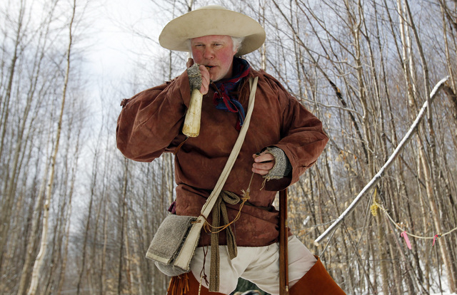 Hunters who use muzzleloaders, like this man in New Hampshire, will find traveling more difficult because of the federal government's prohibitions on transporting black powder. (REUTERS/Jessica Ri ...