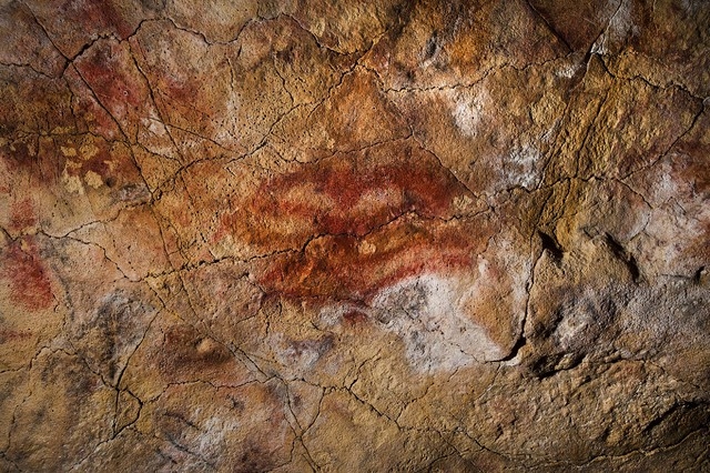 This double "claviform" symbol on the ceiling of the Altamira Cave in Spain is at least 35,600 years old. Access to the caves is limited to five visitors a week. They are chosen at rando ...