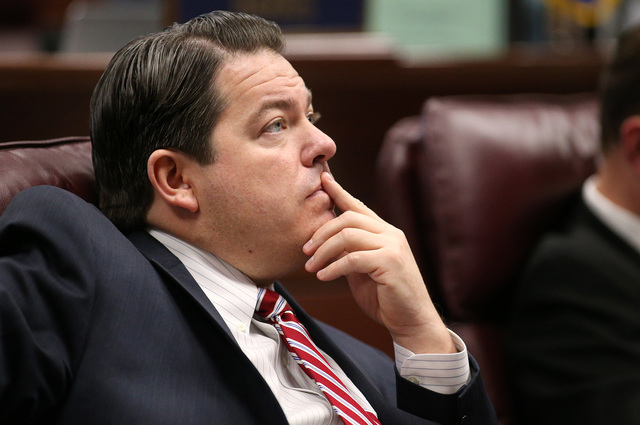 Nevada Senate Majority Leader Michael Roberson, R-Henderson, listens to debate on Gov. Brian Sandoval's tax proposal to overhaul the state's business license fees at the Legislative Building in Ca ...