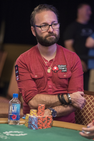 Daniel Negreanu competes during the fourth day of the $10,000 buy-in No-Limit Texas Hold 'em World Series of Poker World Championship at the Rio hotel-casino in Las Vegas on Saturday, July 11, 201 ...