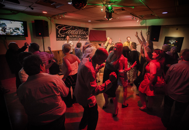 Patrons dance during Monday Nite Jamming at the Tap House, 5589 W. Charleston Blvd., on Monday, June 29, 2015. Jeff Scheid on Twitter @jlscheid (Jeff Scheid/Las Vegas Review-Journal)