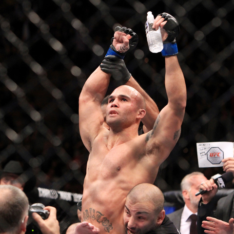 Robbie Lawler celebrates his win over Johny Hendricks in their fight at UFC 181 Saturday, Dec. 6, 2014 at the Mandalay Bay Events Center. Lawlor won by split decision to claim the welterweight bel ...