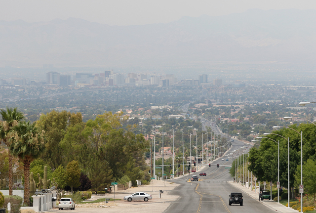 Haze is seen from the base of Frenchman Mountain covering the valley and downtown Las Vegas Friday, June 26, 2015. Las Vegas was under a Clark County Department of Air Qualityճ ozone advisor ...