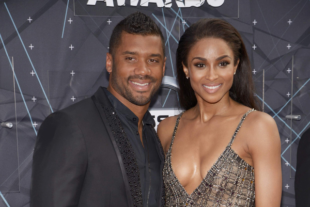 Football player Russell Wilson and singer Ciara arrive at the 2015 BET Awards in Los Angeles, California June 28, 2015.  REUTERS/Phil McCarten