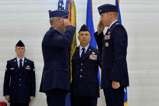 Col. Case Cunningham, 432nd Wing commander, salutes Lt. Gen. Chris Nowland,
12th Air Force commander, during a change-of-command ceremony June 29, 2015 at Creech Air Force Base at Indian Springs,  ...