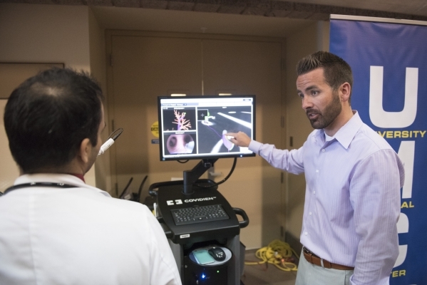 SuperDimensions vendor Aaron Hauser demonstrates how LungGPS technology can be used for Electromagnetic Navigation Bronchoscopy procedures at University Medical Center.(Jason Ogulnik/Las Vegas Rev ...