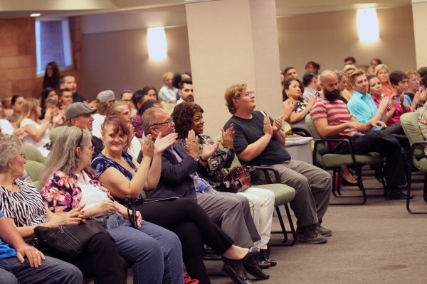 People clap during a graduation ceremony for participants of specialty court programs at the Regional Justice Center in Las Vegas on Friday, July 24, 2015. (Chase Stevens/Las Vegas Review-Journal) ...