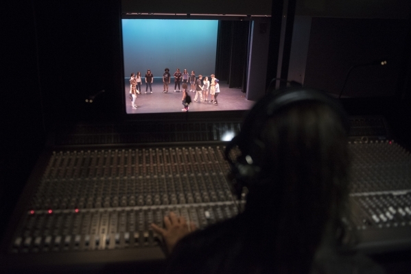 Rainbow Company Youth Theatre participant Morgan Johnson, 16, operates the sound board from the control booth at Charleston Heights Arts Center. The company of primarily young actors will present  ...