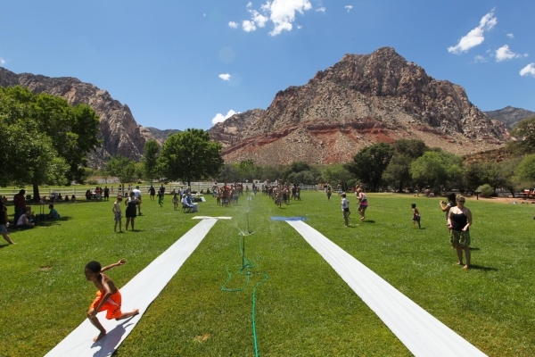 People of all ages came out to Spring Mountain Ranch State Park to take advantage of the horizontal water slides during Water on the Meadow Aug. 2. The event will be held again Aug. 16, 22 and 30. ...