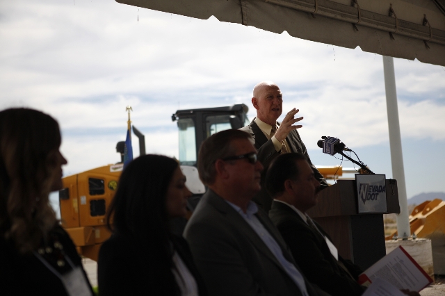 Clark County Commissioner Larry Brown speaks during the ground breaking ceremony for the Centennial Bowl Interchange improvement project at a construction near Interstate U.S. 95 and the westbound ...