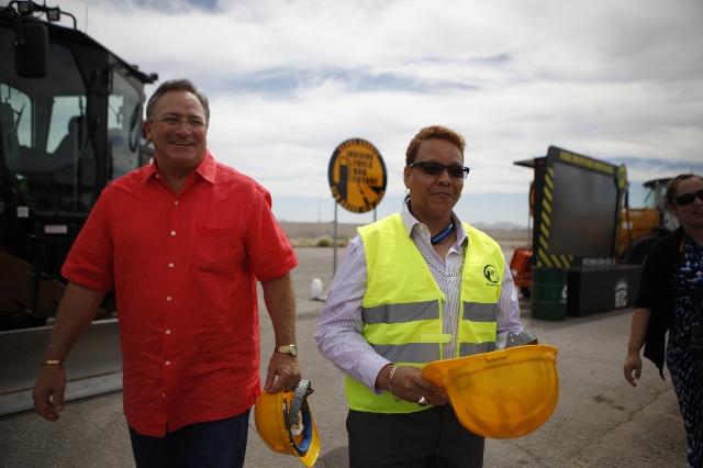 Las Vegas Mayor Pro Tem Steve Ross, left, and  Senator Pat Spearman, participate during the ground breaking ceremony for the Centennial Bowl Interchange improvement project at a construction near  ...