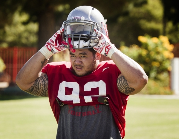 UNLV defensive lineman Salanoa-Alo Wily, shown Monday at Rebel Park, said he is adjusting to Las Vegas heat. "It‘s nice to get to the point where 97 (degrees) is cool to me," he sa ...
