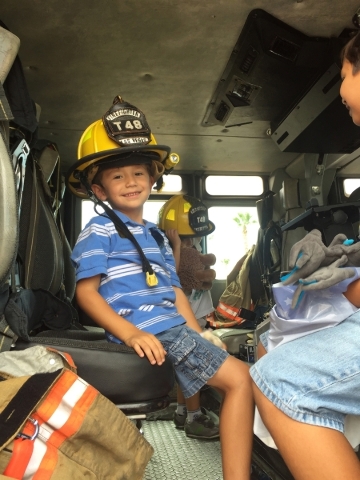 AMR responders talk about what happens during ambulance rides with Tristan Bittner, left, and Ashton Bittner during the Teddy Bear Clinic at Centennial Hills Hospital, 6900 N. Durango Drive, Aug. ...